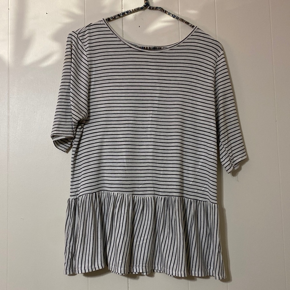 Black and white stripped ruffle bottom top